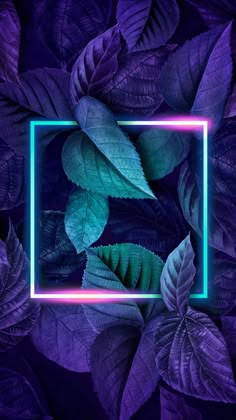 the neon frame is surrounded by purple and green leafy leaves, which are all around