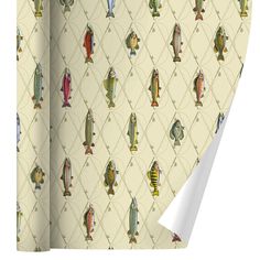 the wall paper has fish on it and is yellow with red, green, blue, orange