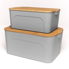 two gray storage containers with wooden lids