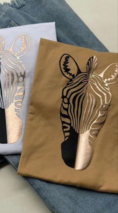 two zebras are shown on the front and back of these t - shirt designs