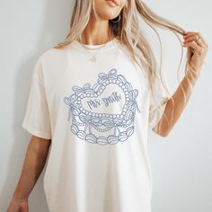 Get ready to say I do in style with our Custom Bride shirt! ️  This shirt is ideal for bridal showers, bachelorette parties, or just showing off your excitement for the upcoming big day! Grab yours today and let the countdown to happily ever after begin! ���💕 Comfort Colors Garment Dyed 1717 Unisex T Shirt Relaxed fit, please check the size chart in photos to ensure the correct size.  100% Ring Spun Cotton Pre-Shrunk Fabric for size retention Care Instructions:  Machine wash cold inside out, Tumbl Bridal Tshirts Design, Bride Tshirt Ideas, Bridal Party Tshirts, Blue Coquette, Bow Cake, Bride Tshirt, Cake Custom, Bow Cakes, Mrs Shirt