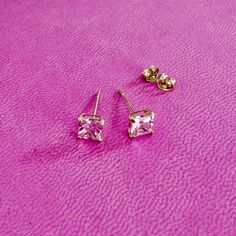 Elevate your everyday style with these stunning 14K yellow gold stud earrings adorned with mesmerizing rose pink cubic zirconia stones. Designed for both elegance and durability, these earrings are perfect for daily wear. Crafted with high-quality materials, these hypoallergenic earrings are gentle on sensitive skin, ensuring comfortable wear all day long. Whether you're heading to the office or out for a casual outing, these earrings add a touch of sophistication to any ensemble. Not only do these earrings boast timeless beauty, but they are also waterproof, making them ideal for all occasions, from busy workdays to leisurely weekends by the pool. Their versatility makes them a must-have accessory in any jewelry collection. Treat yourself or someone special to these exquisite 14K yellow g Pink Stud Earrings, Yellow Gold Stud Earrings, Pink Studs, Gold Stud Earrings, Cubic Zirconia Earrings, Zirconia Earrings, Hypoallergenic Earrings, Gold Stud, Gold Studs