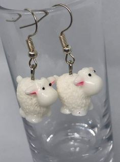 Sheep Earrings Made with hypoallergenic materials, with a silver hook Please note there may be slight variations in colour due to differences in some computer and phone screens.  We have tried our best to present the product as accurately as possible. Novelty White Dangle Earrings, Novelty White Earrings For Pierced Ears, Novelty White Earrings As A Gift, Novelty White Earrings For Gifts, Novelty White Drop Earrings, White Novelty Drop Earrings, White Hypoallergenic Dangle Clip-on Earrings, Cute White Hoop Earrings For Gifts, Handmade Novelty White Earrings