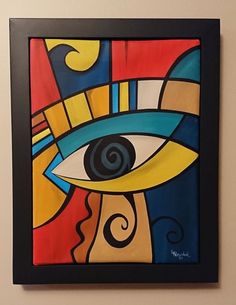 a painting on the wall with an eye in it's center and swirls coming out of its iris