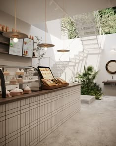 the interior of a coffee shop with stairs