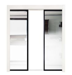 an open sliding glass door with white walls and black trim on the bottom part of it