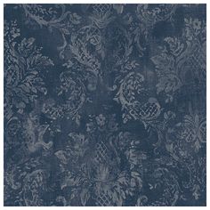 a blue and white wallpaper with an ornate design on it's surface,