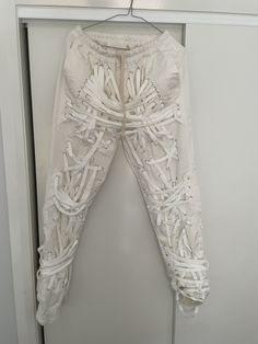 Gothic lace pants  #distressedpants #gothicpants #streetstyle #chinesepunk Edgy Cotton Pants For Festivals, Distressed Stretch Pants For Streetwear, White Fitted Gothic Bottoms, Gothic Pants Vampirefreaks, Gothic Fitted Pants With Pockets, Gothic Fitted Pants With Belt Loops, Gothic Streetwear Trousers, Distressed Pants, Gothic Pants