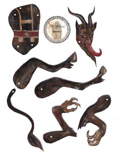 an assortment of carved animal heads and horns, including a snake with its mouth open