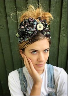 1940s floral print turban style head band. A real statement piece with a standard width inner Alice band attached within the lining to provide an easy to wear design. Completed with quills of fabric, buttons and lined with a fine fleece. The perfect accessory for style and added warmth. This unique creation is a stunning example of a vintage inspired accessory with an eye catching easy to wear and lightweight design. Vintage Spring Headband, Bohemian Turban With Matching Headband, Bohemian Adjustable Headscarf With Matching Headband, Bohemian Headwrap One Size Fits Most, Bohemian One Size Fits Most Headwrap, Hippie Style Headwrap, Bohemian Summer Turban Headband, Bohemian Summer Turban With Matching Headband, Bohemian Turban For Festivals