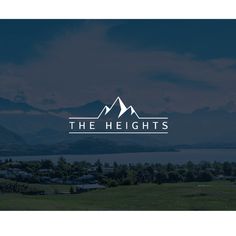 the heights logo on a dark blue background with mountains in the distance and water below