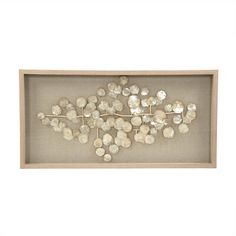 an art piece in a wooden frame with white flowers on the inside and bottom half