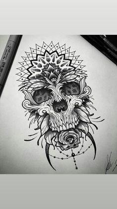 a drawing of a skull with flowers on it