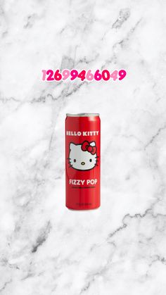 a red can with hello kitty on it sitting on top of a white marble counter