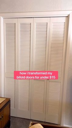 a bedroom with white closet doors and a pink sign that says how i transformed my bifold doors for under $ 15