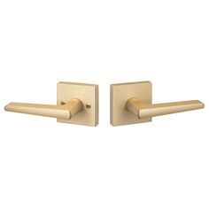 an image of two door handles on a white background, one is gold and the other is satin brass