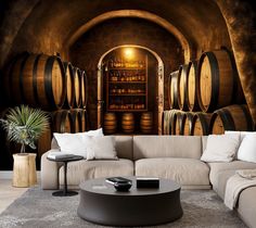 a living room filled with furniture and wine barrels