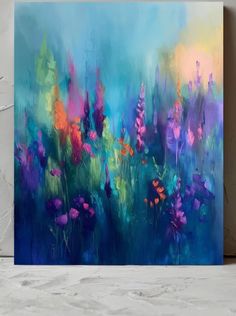 an abstract painting of flowers in blue and pink