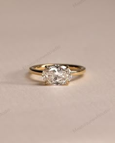 an engagement ring with a single diamond in the center