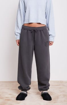 Stay cozy and stylish with the Los Angeles Football Sweatpants from PacSun. These sweatpants are crafted with a soft fleece lining and a trendy snow wash finish, featuring a high-rise fit and an interior drawstring waistband for comfort. Complete with side hand pockets, elastic ankle cuffs, and a bold PacSun Los Angeles football graphic, these pants are perfect for lounging or showing off your team spirit.Solid color sweatpants12" rise29" inseam11" leg openingSoft fleece liningSnow wash finishHi Football Sweatpants, Pacsun Sweatpants, Sweatpants Black, Xmas List, Ankle Cuffs, Womens Loungewear, Drawstring Waistband, Stay Cozy, Team Spirit