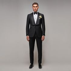 Brent Wilson Made to Measure Suiting - model wears two piece black satin shawl collar suit with a white tuxedo press stud shirt and black bow tie. All Black Tuxedo, Black Tuxedo Wedding, Men's Tuxedo Wedding, Suits Business, Black Tuxedo Suit, White Wedding Suit, Shawl Collar Tuxedo, Wedding Tux, Made To Measure Suits