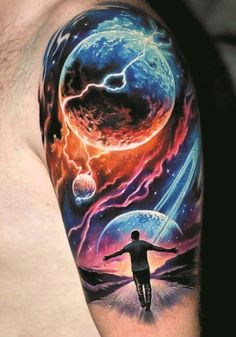 a man's arm with an image of planets and a person on the other side