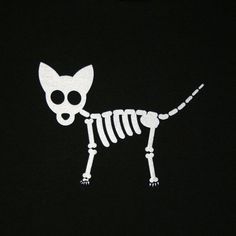 a cat skeleton is shown on a black shirt