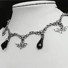 Add a touch of dark elegance to any outfit with our Gothic Victorian Pendant Choker Necklace. The intricate design and choker style make this necklace a unique and stylish addition to your jewelry collection. Stand out from the crowd with this must-have accessory! Gothic Dangle Necklaces For Parties, Gothic Pendant Necklace For Party, Gothic Choker Necklace For Formal Occasions, Adjustable Gothic Necklace For Formal Occasion, Formal Gothic Metal Choker, Gothic Metal Dangle Necklaces, Gothic Metal Necklaces With Jewels, Gothic Dangle Necklaces For Jewelry Making, Halloween Choker Necklace With Chain