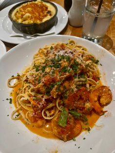 pasta with shrimp, tomato sauce and parmesan cheese