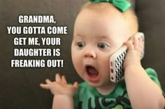 a baby talking on a cell phone with a funny caption in front of it