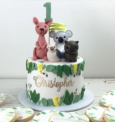 there is a cake with animals on it