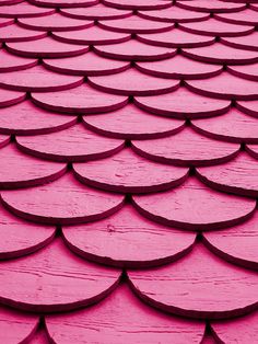 a close up view of a pink roof