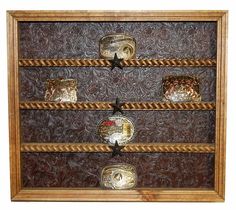 an old wooden shelf with glass knobs on the front and bottom shelves, decorated with ornate designs