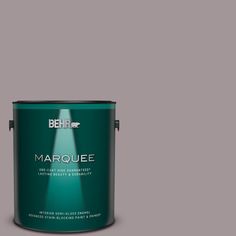 the behr marquee paint is light brown and has a green tint