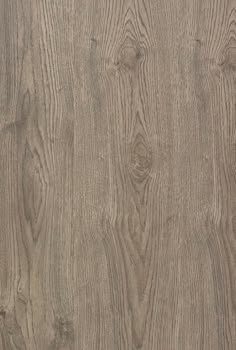 a close up view of the wood grains on this flooring material, which is light brown