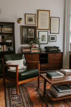 a living room filled with furniture and pictures on the wall