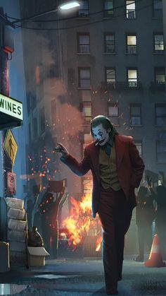 a man dressed as the joker walking down a street