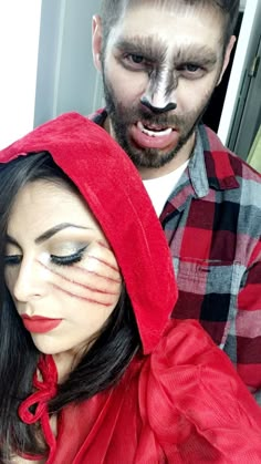 a man and woman are dressed up as clowns for the halloween season, with makeup on their faces