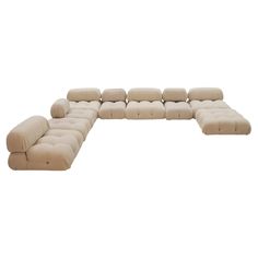 Camaleonda modular sofa designed by Mario Bellini (1935) for C&B Italia in 1972. Composed of 4 large modular seats with backrest, 3 small modular seats with backrest, 1 small module without backrest and 1 shoe remover chair. White bouclé wool upholstery. Measurements of large seats (5): W 96 x D 96 x H 40/65 cm. Measures small seats (4) : W 66 x D 96 x H 40/65 cm. Every item LA Studio offers is checked by our team of 10 craftsmen in our in-house workshop. Special restoration or reupholstery requ Italy 70s, Modular Sofa Design, Mario Bellini, Italia Design, Italian Mid Century Modern, New York Museums, Boucle Fabric, Marble Colors, Bellini