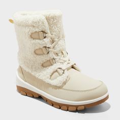 Conquer cold weather in style with these Corie Shearling Hiker Winter Boots from Universal Thread™. The lace-up boots feature a faux-suede foot and a cozy faux-shearling leg with a 6-inch shaft height, along with a comfy insole and lining to wrap your feet in warm comfort. Set on a treaded outsole, they're suitable for hiking and walking on snowy trails. Universal Thread™: Found exclusively at Target. Women’s Winter Boots, No Heel Boots, Neutral Boots, Boots Target, Target Boots, Hiker Boots, Cozy Style, Shoes Boots Ankle, Rubber Boot