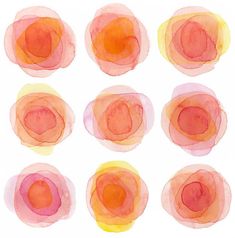 six watercolor circles are shown in different colors and sizes, each with an orange center