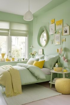 a bedroom with green walls and yellow accessories on the bed, along with white rugs