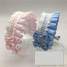 three pieces of lace with bows on them