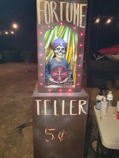 a sign with a skeleton on it that says fortune teller 5 / 4 - 6