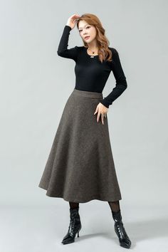 ★★ Welcome to my Ylistyle's shop！！！ This midi plaid a line wool skirt, wear it in autumn and winter to keep you warm and comfortable. Our long tatan skirt, suitable for various occasions, whether for everyday wear or formal events. ★★FEATURES 30% wool, other fiber Polyester lining Back zipper closure Midi skirt A line skirt Prom skirt Tartan skirt Autumn winter wool skirt Dry clean ★★ The model's height approx 170 cm (5′ 7″) with the 84 cm (33") bust, 66 cm (26") waist. She is wearing the wool skirt in size XS (US2) ★★ Please select custom order according to the follow situation Can't find your size Your height is over 175cm Your weight is over 75kg Request Length custom Request sleeve length ★★ Get your size in Size Chart with your body measurement https://www.etsy.com/listing/794055682 ★ Big Sweater With Skirt, Custom Skirt, Long Wool Skirt, Beach Outfit For Women, Prom Skirt, Skirt Winter, Plaid Wool Skirt, Skirt A Line, Winter Skirt Outfit