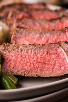 some meat and vegetables on a plate