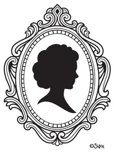 the silhouette of a woman's head in an ornate frame