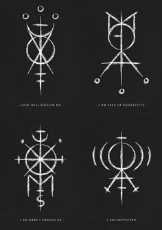 four different types of symbols on a black background