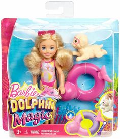 barbie doll in pink swimsuit with dog and pool floater on the beach set