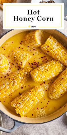 a pot filled with corn on the cob